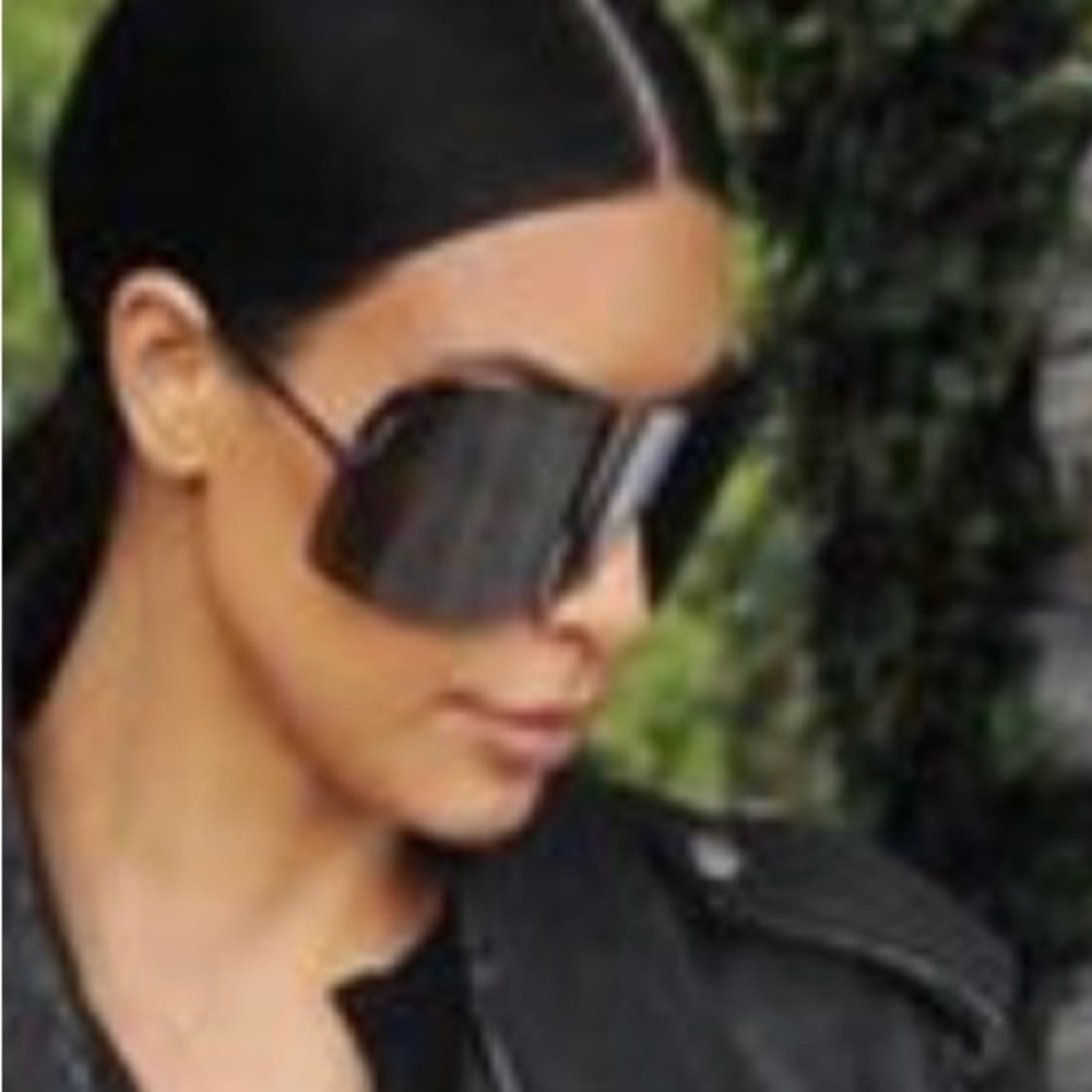 Rick Owens 
black 
sunglasses. 
shield 
box and case